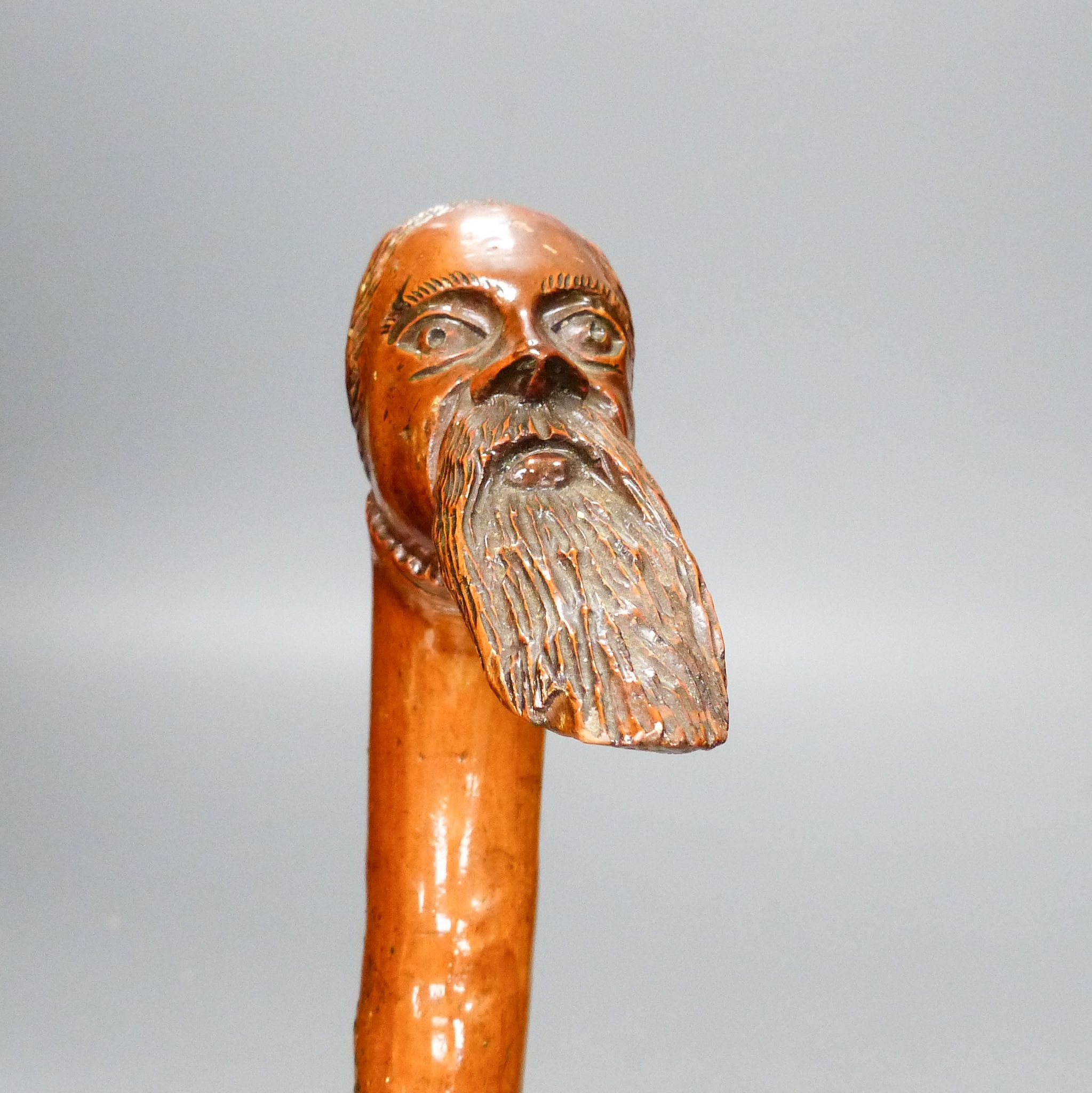 A 19th century carved briar walking stick